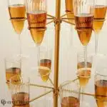 La Tour de Champagne – Présentoir doré pour 12 flûtes